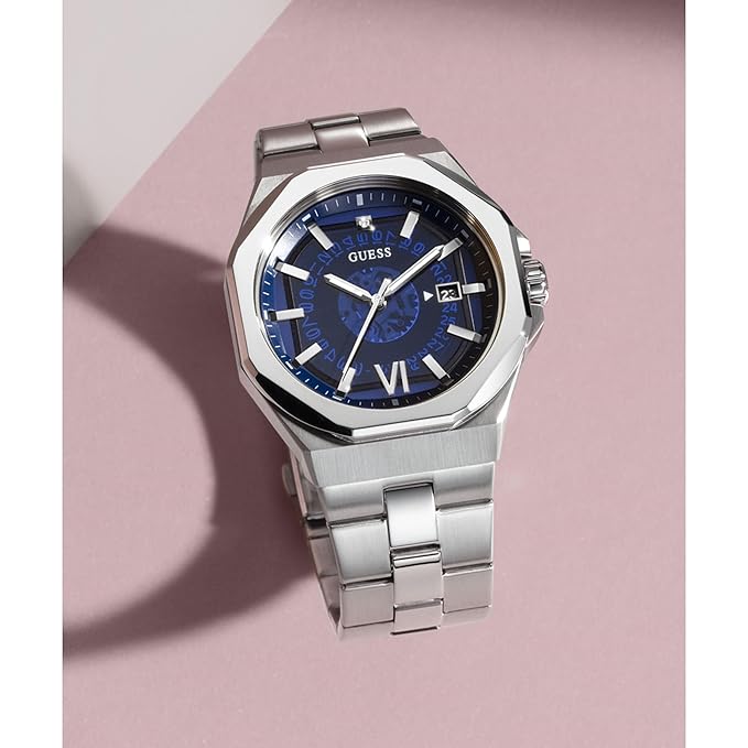 GUESS EMPEROR men's watch on-wrist display on pink background