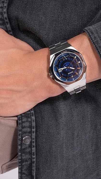 GUESS EMPEROR men's watch worn on wrist showing blue dial and bracelet fit