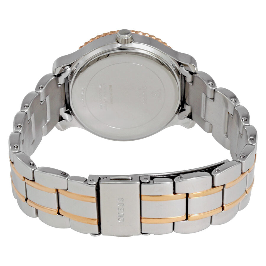 Back view of Guess Enchanting watch showing stainless steel caseback and two-tone bracelet