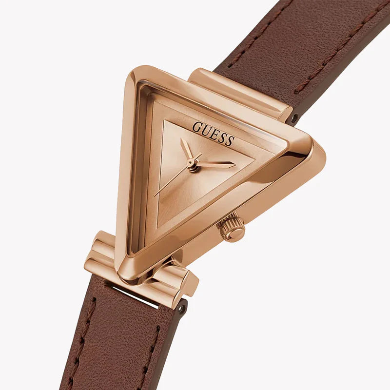 Close-up of Guess Fame rose gold triangular dial with hour markers and hands