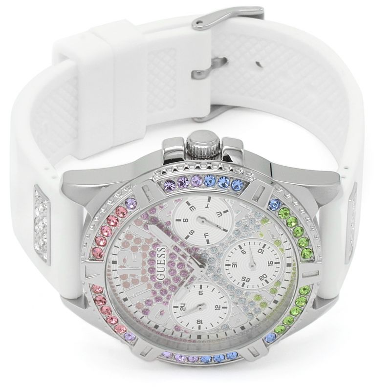 Guess Frontier women's chronograph watch on wrist with white rubber strap and colorful bezel