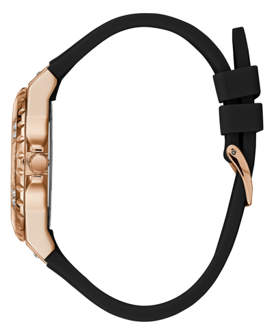 Side view of Guess Fusion watch showing rose gold case profile and black strap