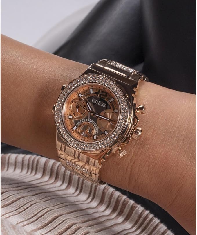 Guess Fusion women's chronograph watch on wrist, rose gold with diamond bezel
