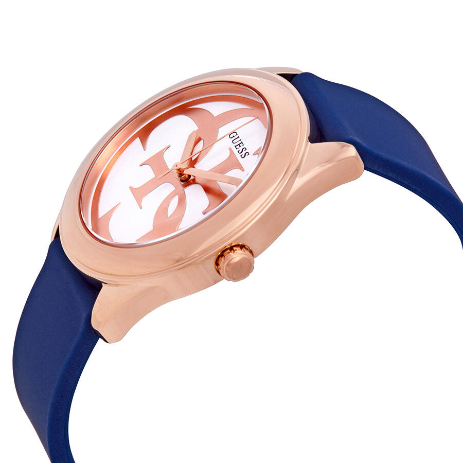 Guess G-Twist watch at angle showing rose gold case, silver dial, and blue silicone strap