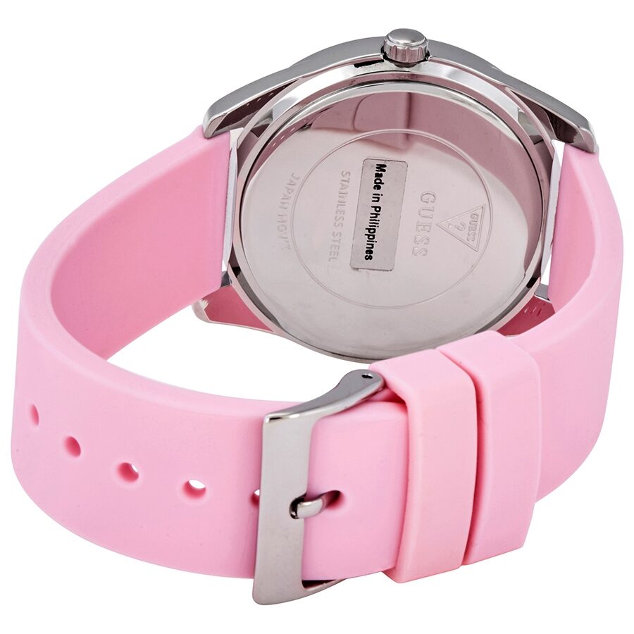 Guess G-Twist watch caseback showing stainless steel back and pink silicone strap with buckle