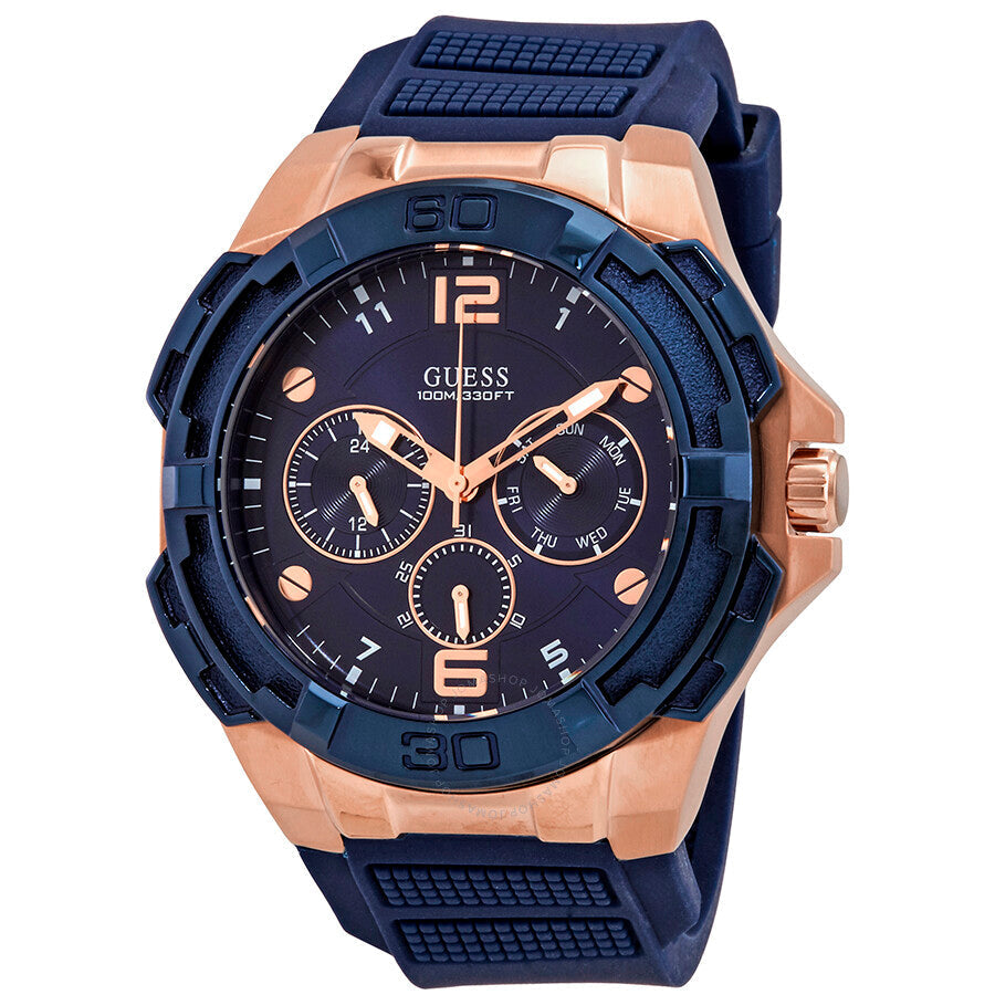 Guess Genesis quartz men's watch with blue dial, rose gold case, and navy rubber strap