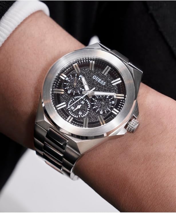 Guess GW0798G1 stainless steel chronograph watch worn on wrist showing black dial and round case