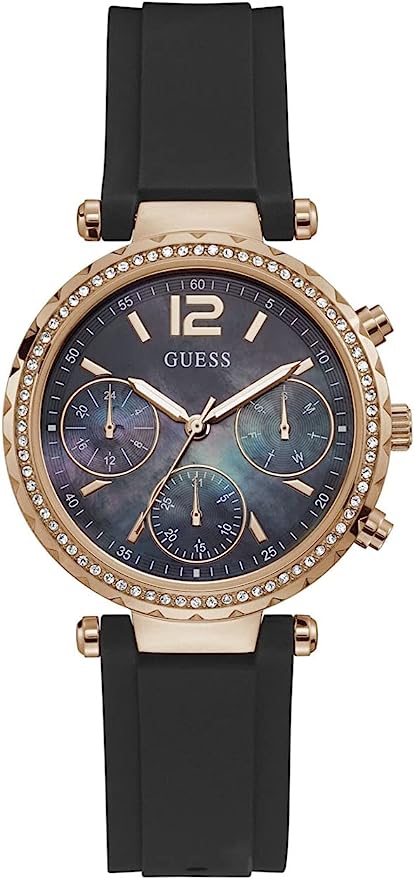Guess women's chronograph watch with rose gold case, navy dial, and black silicone strap