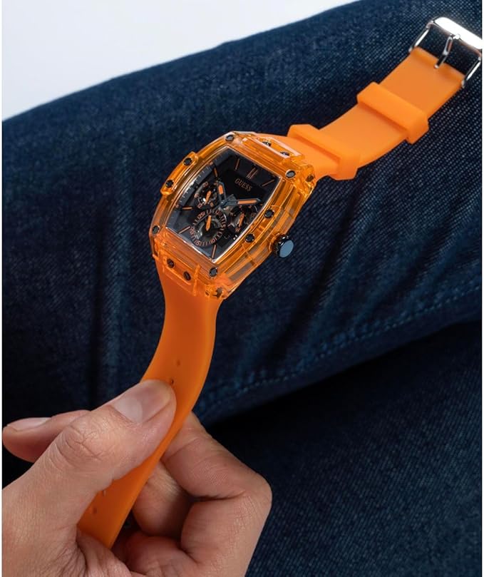 GUESS GW0203G1 orange transparent watch on wrist with rubber strap