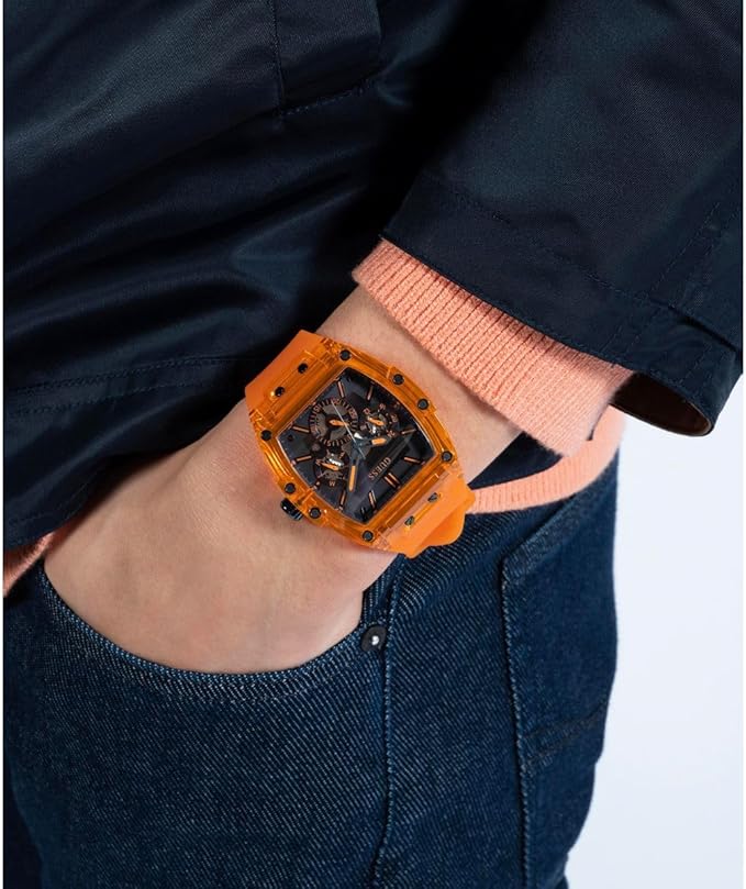 GUESS GW0203G1 watch worn on wrist with orange transparent case
