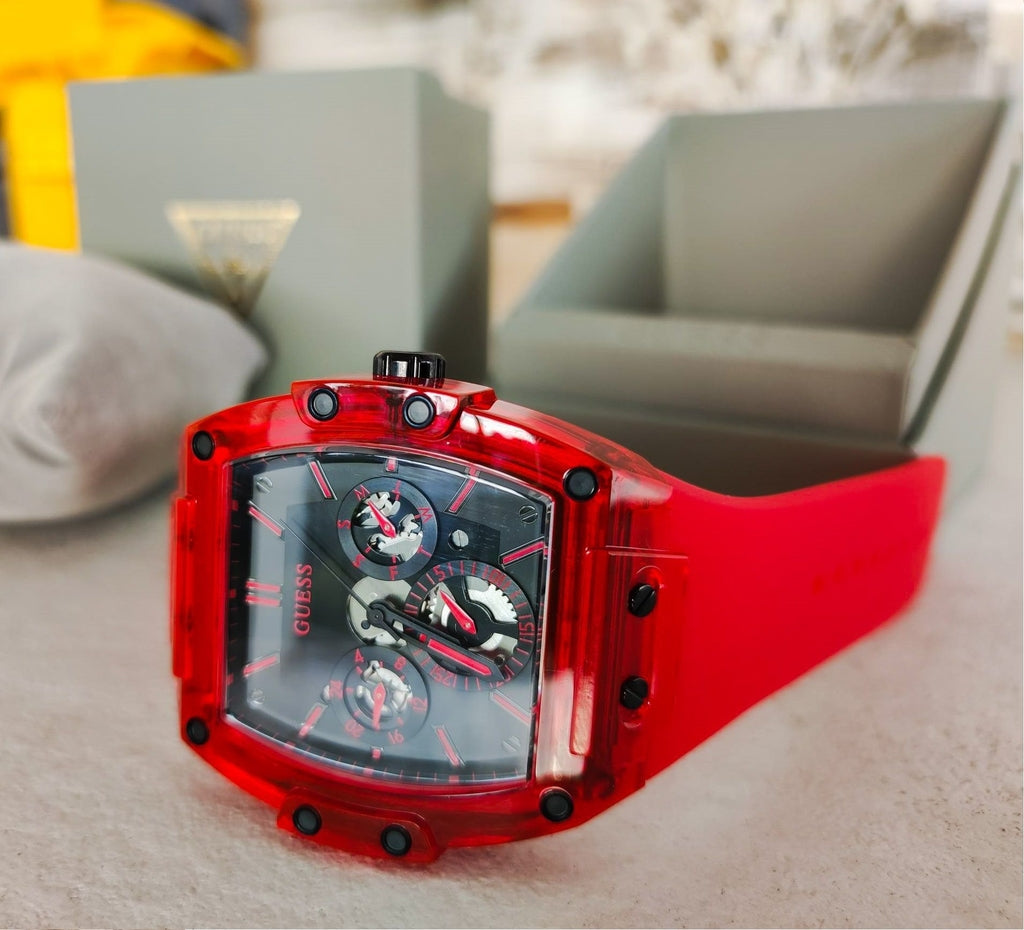 Guess red silicone men's watch with chronograph dial displayed on wrist