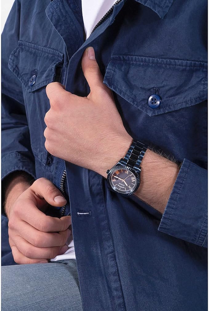 Man wearing GUESS Navy Day/Date watch on wrist with navy shirt