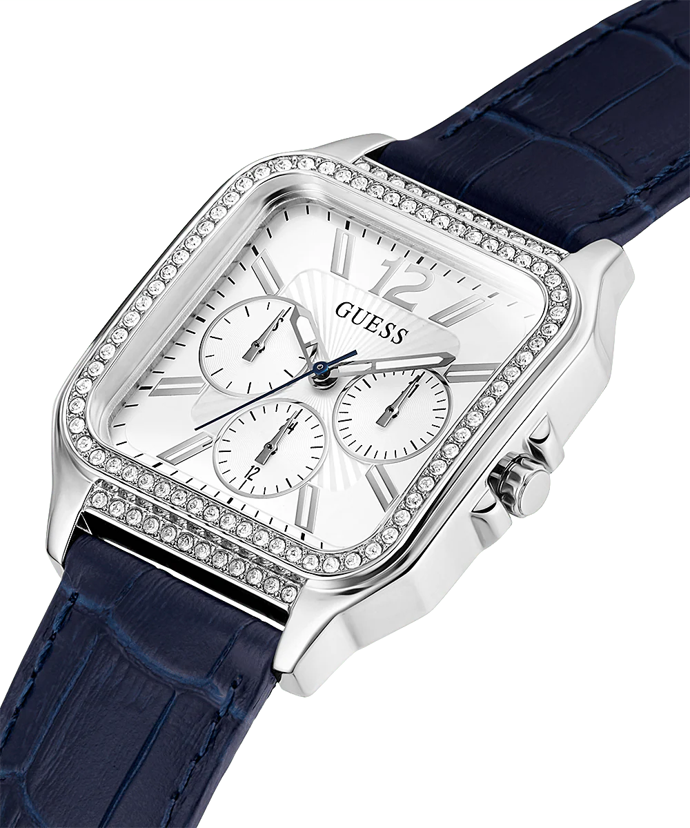 GUESS blue leather women's watch angled view showing white square dial and rhinestone case details