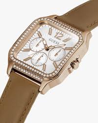Angled view of Guess watch showing crystal bezel and silver chronograph dial