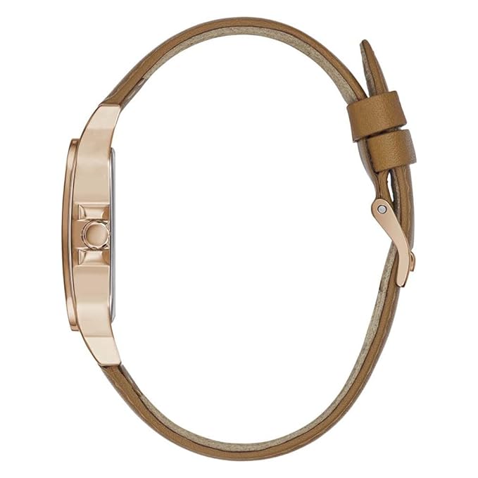 Side view of watch showing brown leather strap and rose gold case