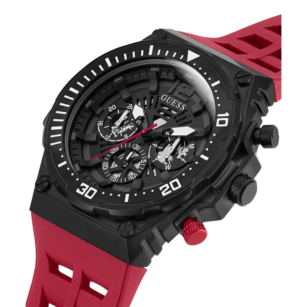 Close-up of Guess GW0325G3 black skeleton dial with visible movement and red accents