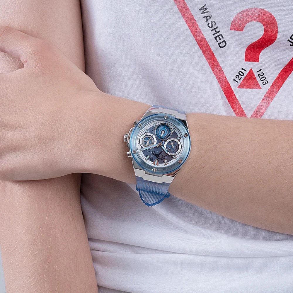 Guess GW0409L1 blue silicone watch worn on wrist with chronograph dial