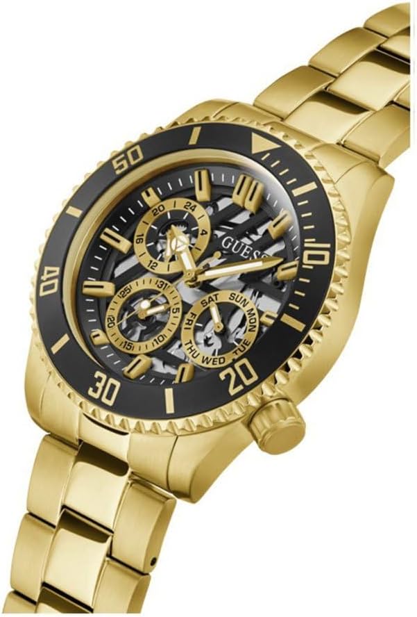 Angled view of Guess GW0488G2 gold skeleton watch with visible chronograph subdials on black dial