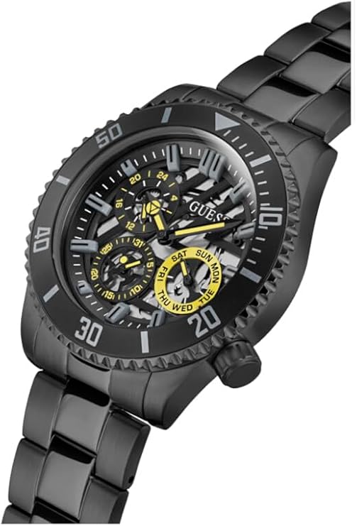 GUESS GW0488G3 black skeleton watch worn on wrist showing full dial and bracelet