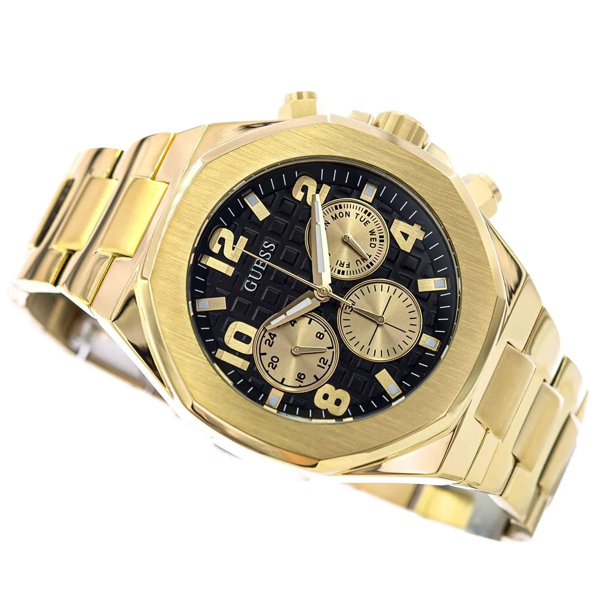 GUESS GW0489G2 men's gold chronograph watch worn on wrist with metal bracelet