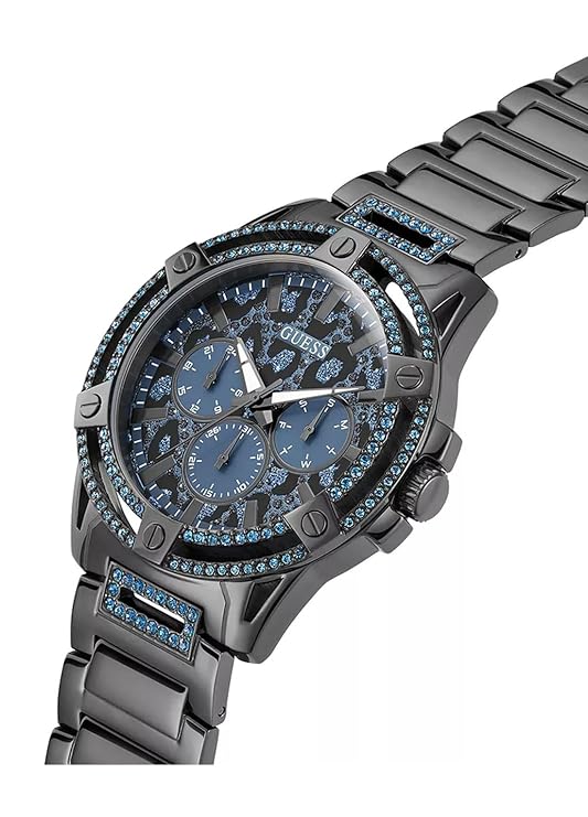 GUESS GW0497G5 gunmetal multi-function watch worn on wrist with stainless steel bracelet