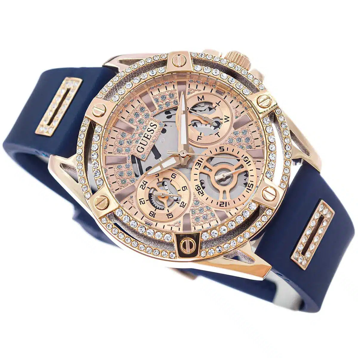 Guess GW0536L5 dial detail with multi-function subdials, rose gold hands, and crystal markers