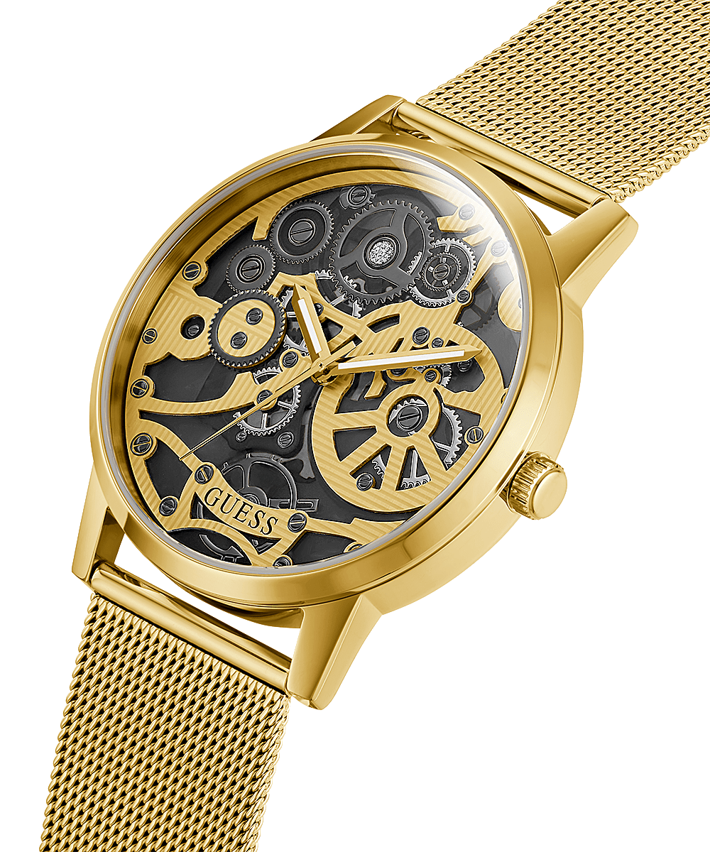 Guess GW0538G2 angled view showing gold case, skeleton dial, and mesh band