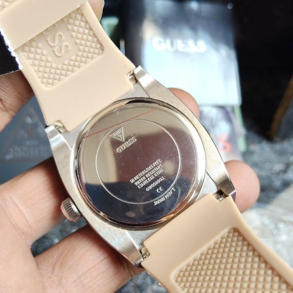 Guess GW0569G1 case back with engraved GUESS branding and specifications