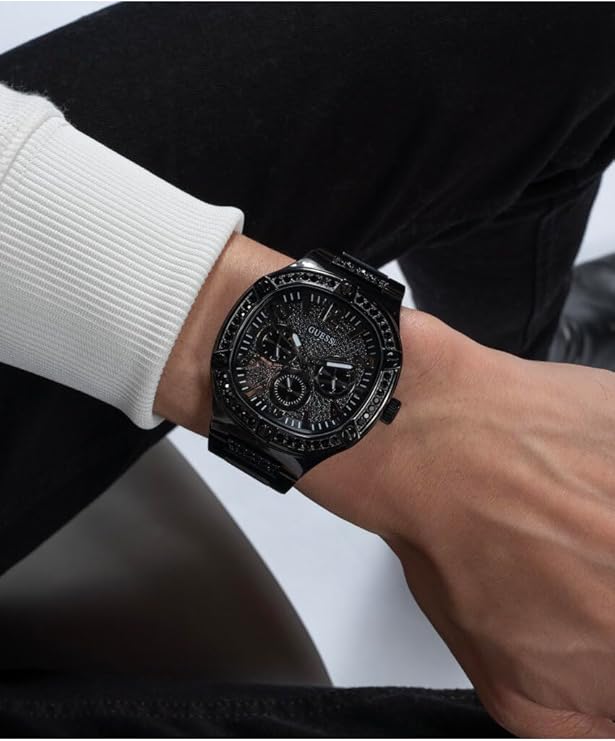 GUESS GW0576G3 black watch on wrist showing dial and bezel design