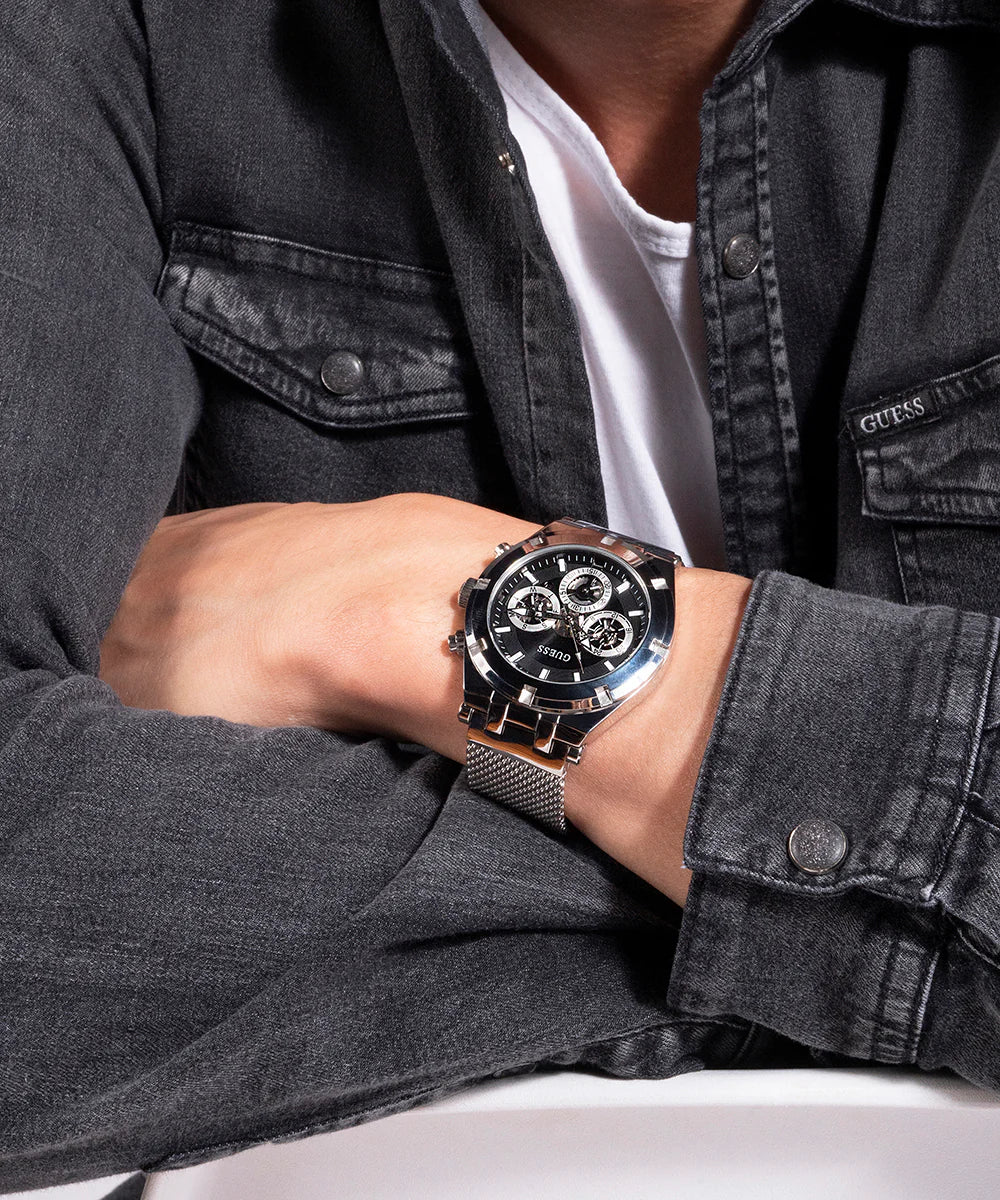 Guess GW0582G1 chronograph watch with black dial and rose gold accents on wrist
