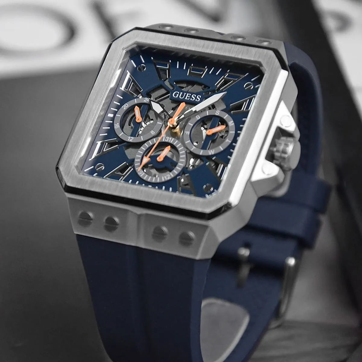 Close-up of Guess GW0637G1 navy dial with chronograph subdials and applied indices