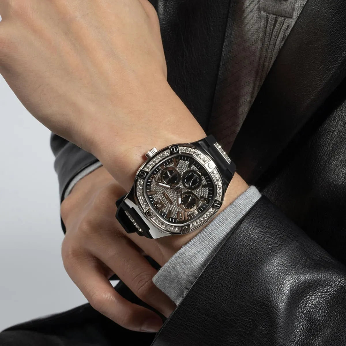 GUESS GW0641G1 men's watch on wrist displaying crystal bezel and chronograph subdials