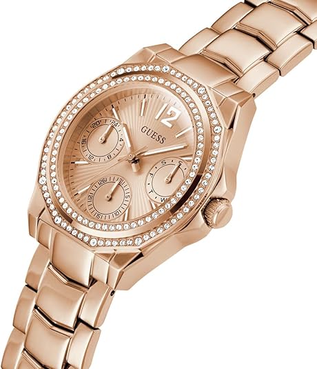 Angled view of rose gold multi-function watch with crystal-set bezel