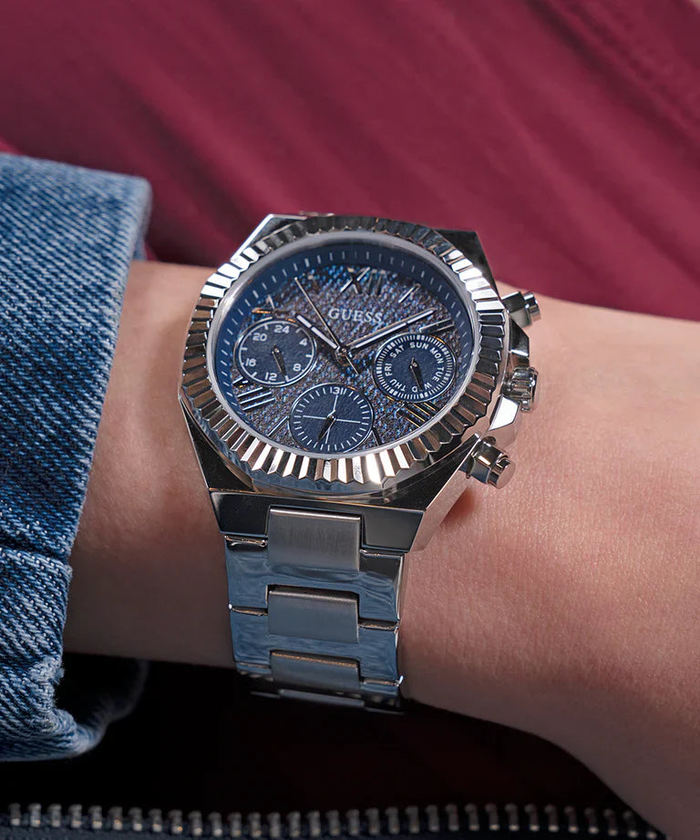 GUESS GW0769L1 ladies multi-function watch on wrist with silver metal bracelet and blue dial