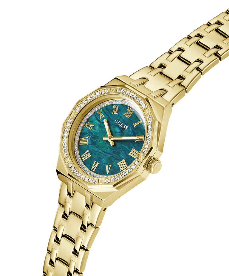 Angled view of GUESS gold tone watch with blue Roman numeral dial and crystal-adorned bezel