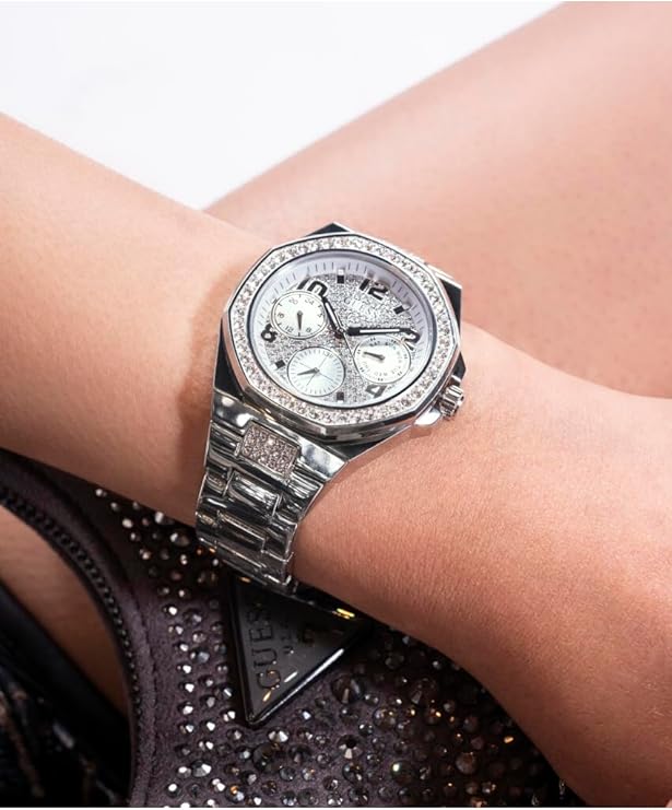 GUESS GW0777L1 silver multi-function watch worn on wrist