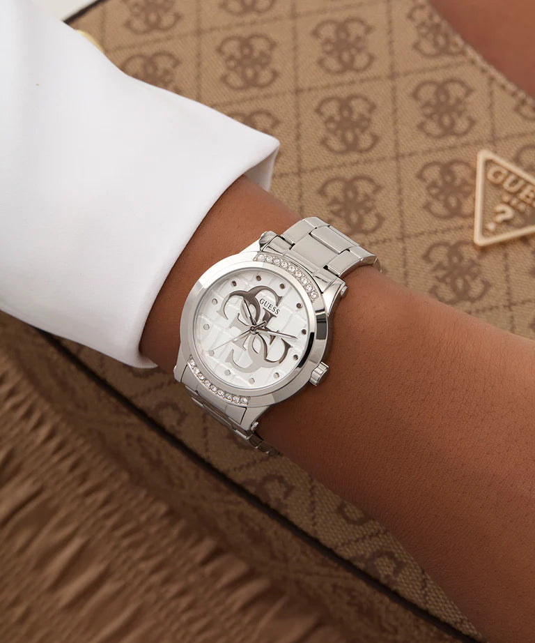 GUESS GW0861L1 silver tone ladies watch worn on wrist with white sleeve