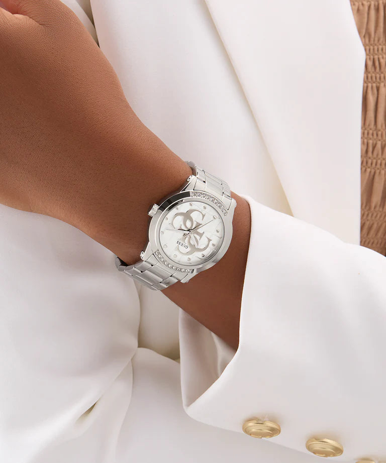 GUESS GW0861L1 watch on wrist displaying silver tone band and dial