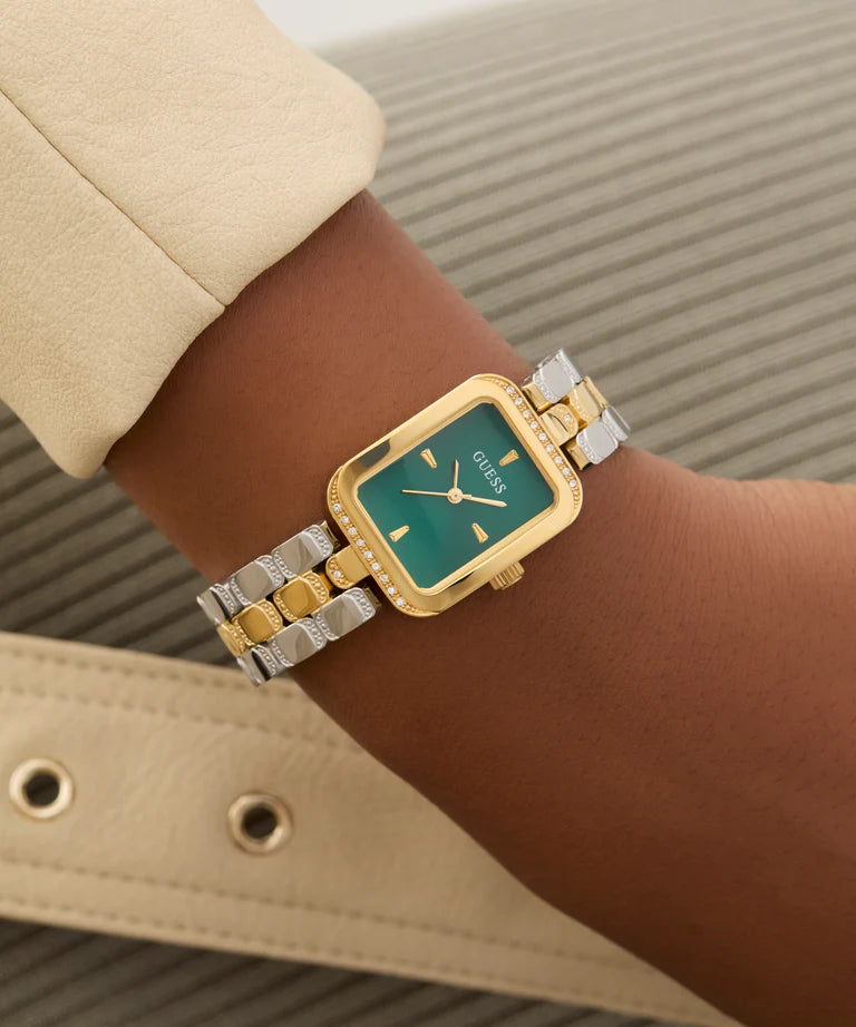 GUESS GW0865L6 watch on wrist highlighting rectangular green dial and 2-tone strap