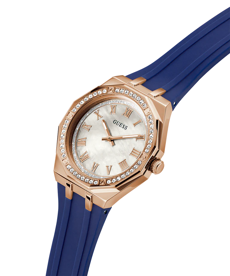 GUESS GW0872L3 angled view showing rose gold case, crystal bezel, and blue silicone strap