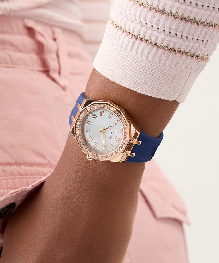 GUESS GW0872L3 worn on wrist displaying white dial with rose gold tone hands