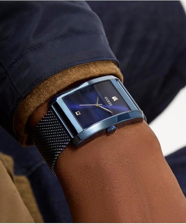 GUESS GW0898G2 worn on wrist showing rectangular case and mesh strap detail