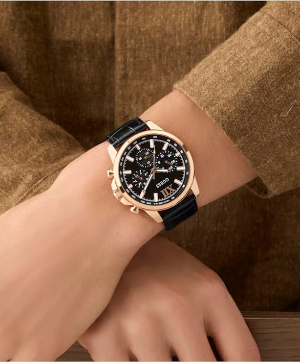 Guess GW0901G5 on wrist showing rose gold case and black dial with chronograph functionality