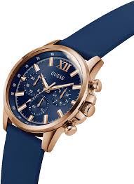 Angled view of GUESS GW0913G1 mens chronograph watch with blue strap and rose gold case