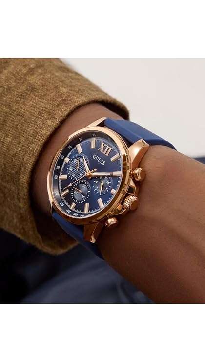 Close-up on-wrist view of GUESS GW0913G1 chronograph with multi-function blue dial