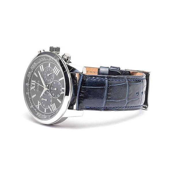 Guess Horizon watch displayed at angle showing black dial and blue croc-embossed leather strap