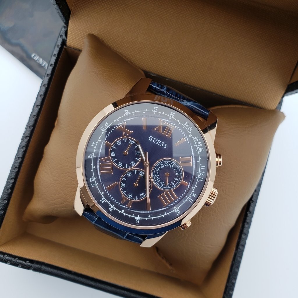 Guess Horizon watch displayed in original Guess Collection packaging box