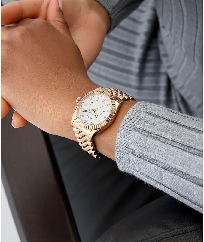 GUESS Jada watch on wrist showing rose gold case and bracelet styling