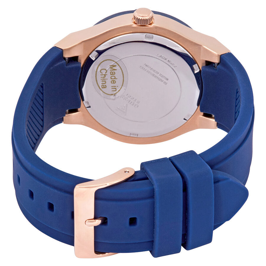 Guess Jet Setter caseback and strap showing blue rubber band with rose gold buckle
