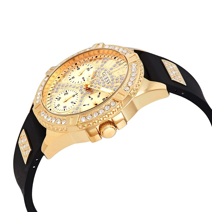 Side angle view of Guess Lady Frontier watch with gold case and black silicone strap